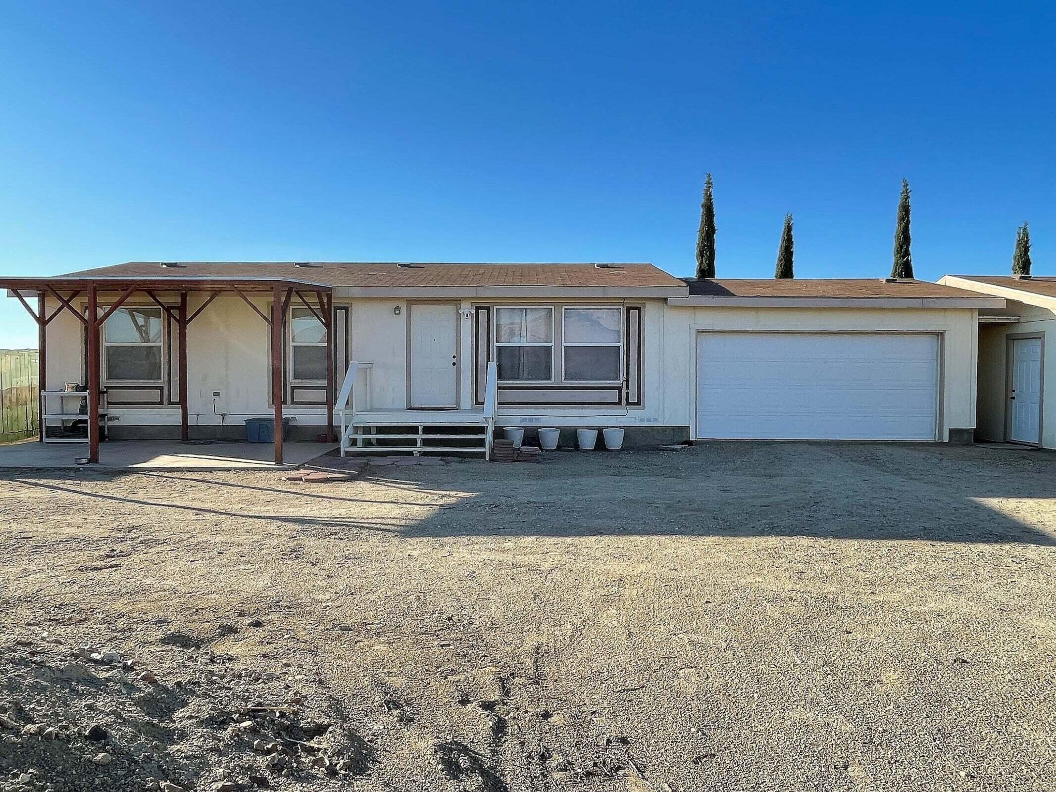 2285 Backus Road Mojave, CA 93501 - Photo 2 of 35 a view of a house with a yard