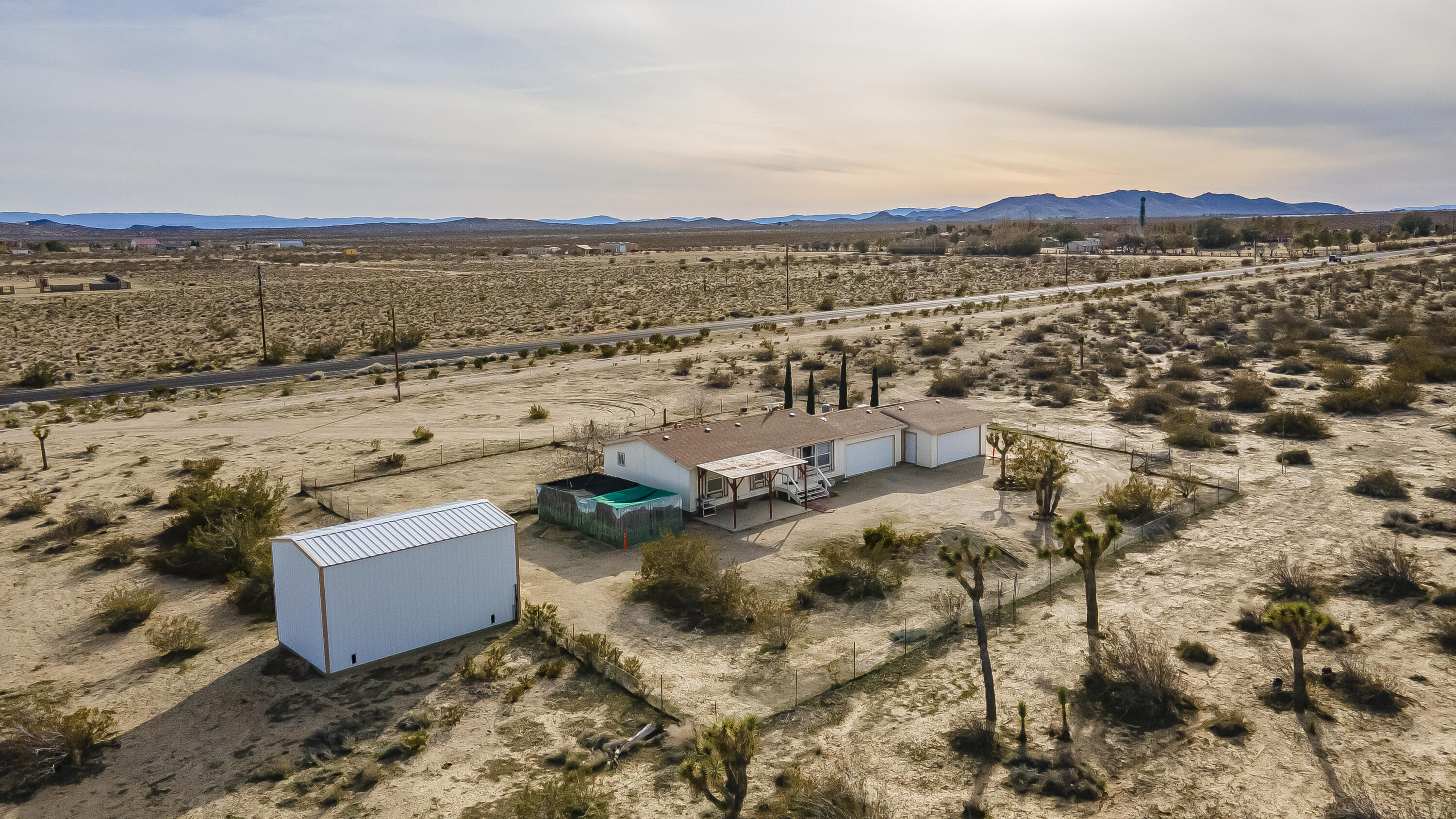 2285 Backus Road Mojave, CA 93501 - Photo 34 of 35 an aerial view of a house with a lake view