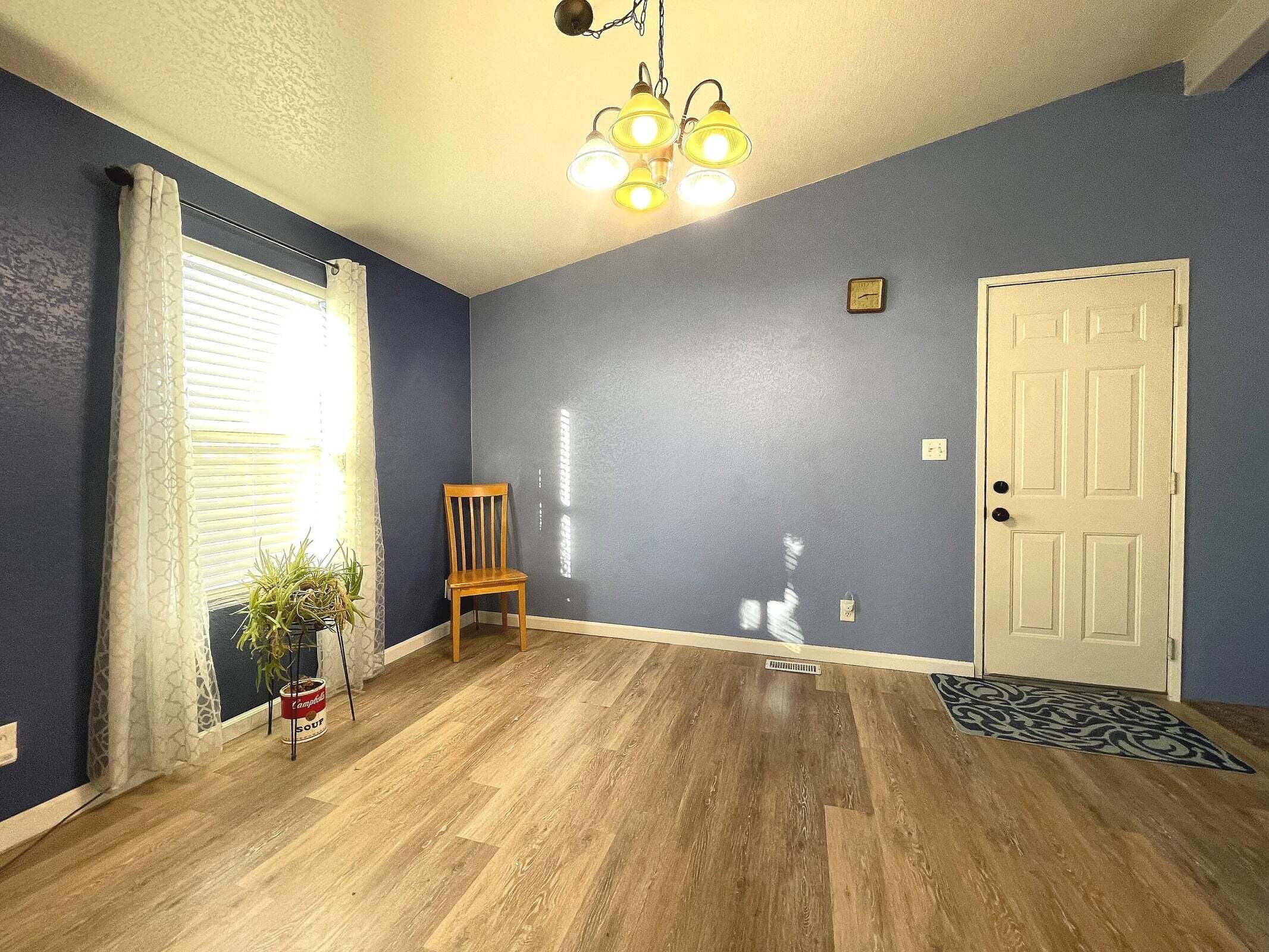 2285 Backus Road Mojave, CA 93501 - Photo 9 of 35 a bedroom with a bed and a window