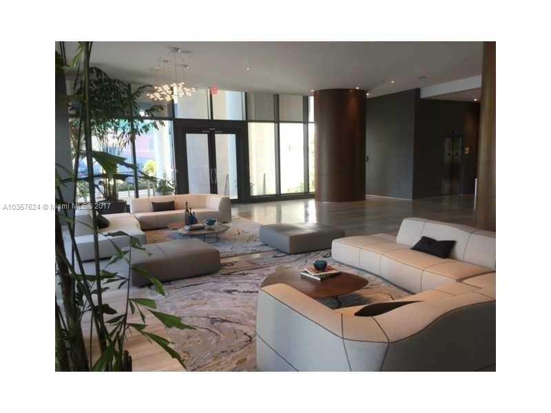 460 Northeast 28th Street, Unit 2001 Miami, FL 33137 - Photo 14 of 28 a living room with furniture and a large window