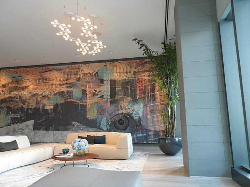 460 Northeast 28th Street, Unit 2001 Miami, FL 33137 - Photo 16 of 28 a living room with furniture and a large window