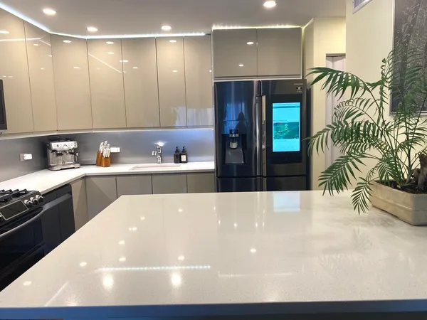 a view of cabinets and a kitchen with a sink