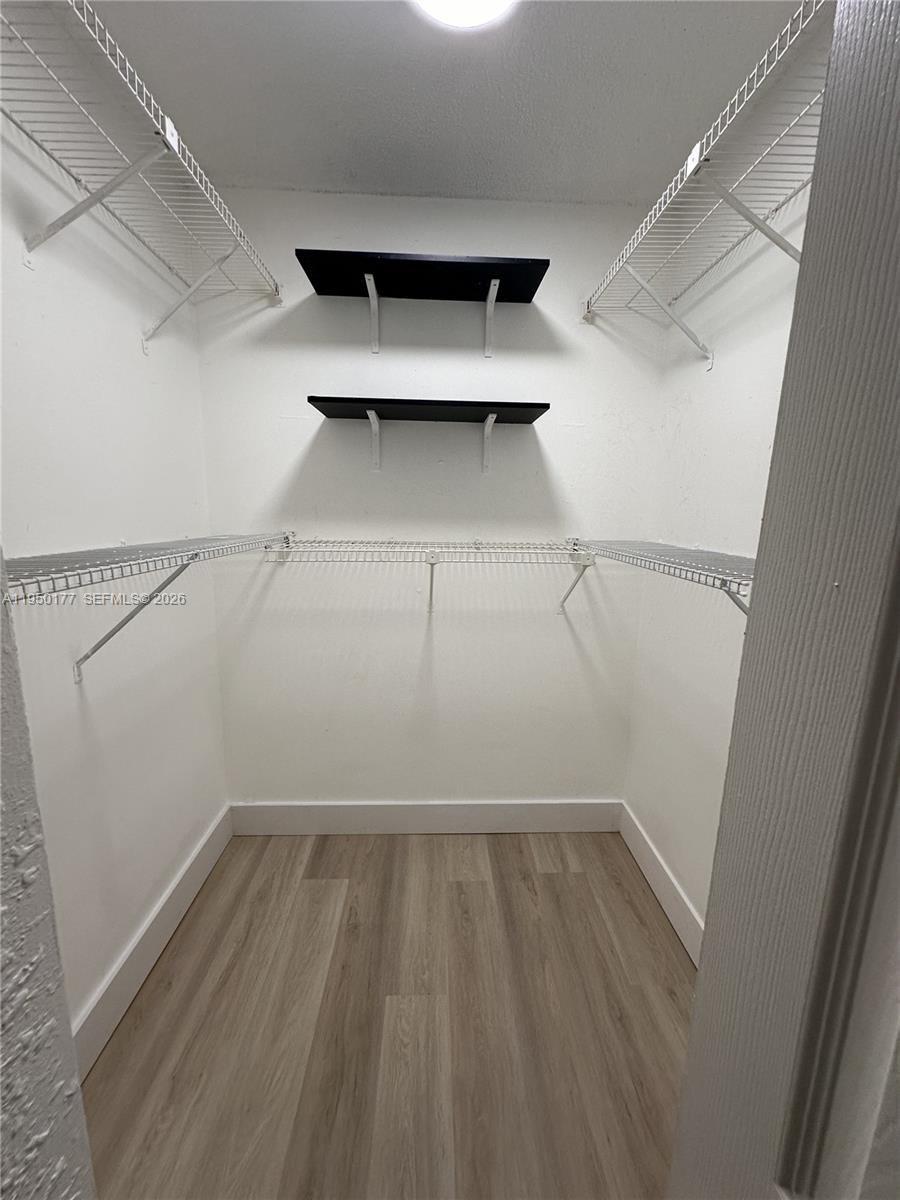 10795 Southwest 108th Avenue, Unit 304 Miami, FL 33176 - Photo 12 of 17 a view of storage and utility room