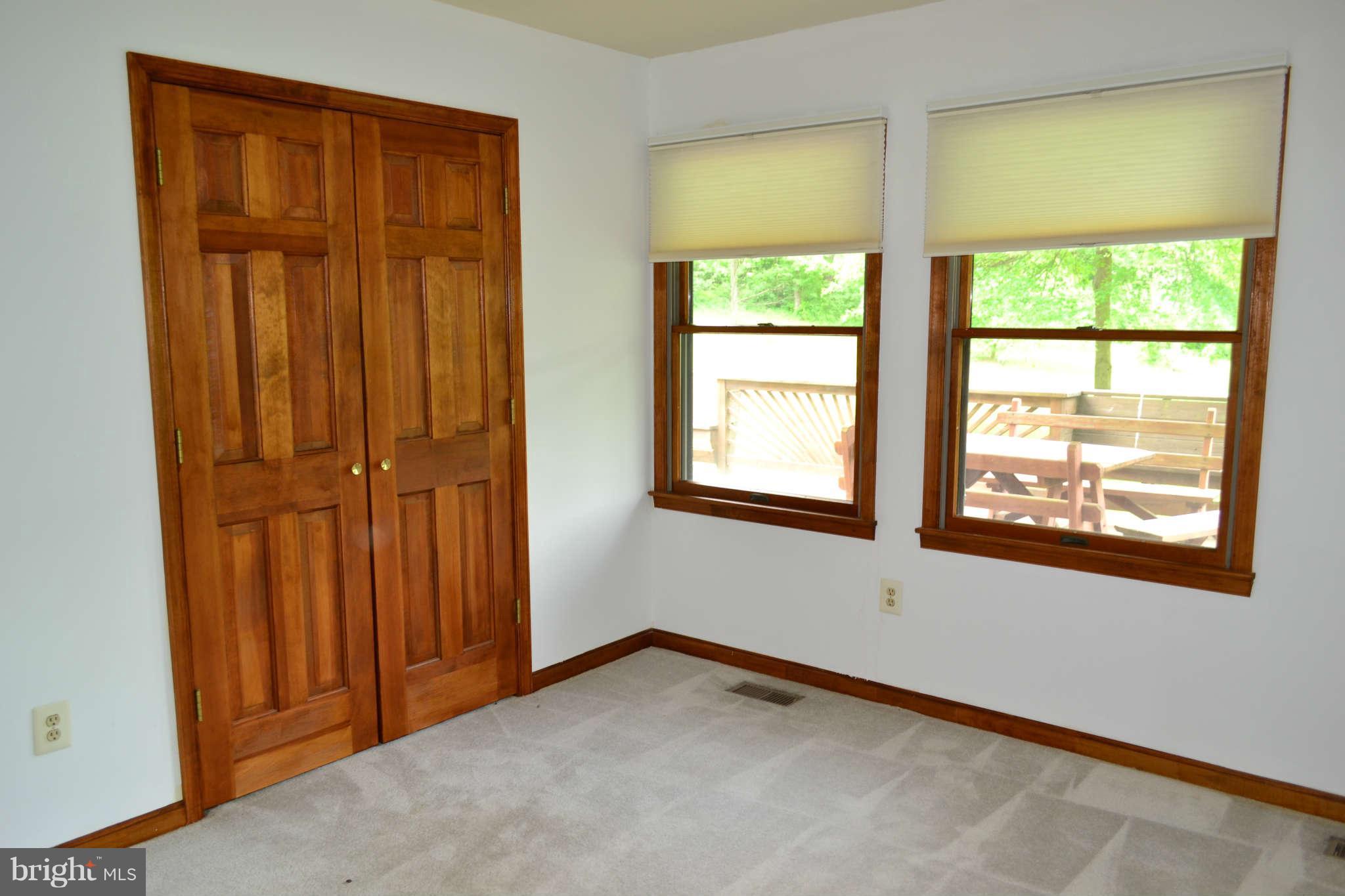 18714 Falls Road Hampstead, MD 21074 - Photo 14 of 30 an empty room with windows