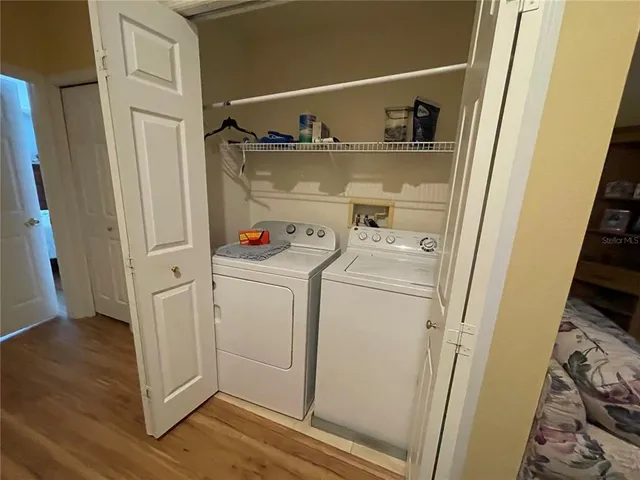a utility room with dryer and washer