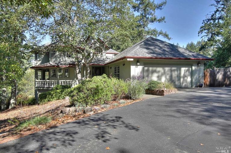 11102 Cherry Ridge Road Sebastopol, CA 95472 - Photo 1 of 1 a front view of a house with a garden