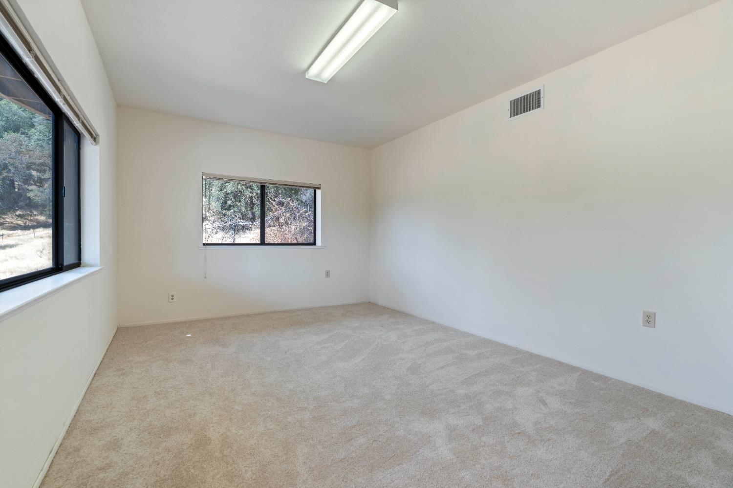 3830 Wilson Loop Placerville, CA 95667 - Photo 24 of 36 an empty room with windows