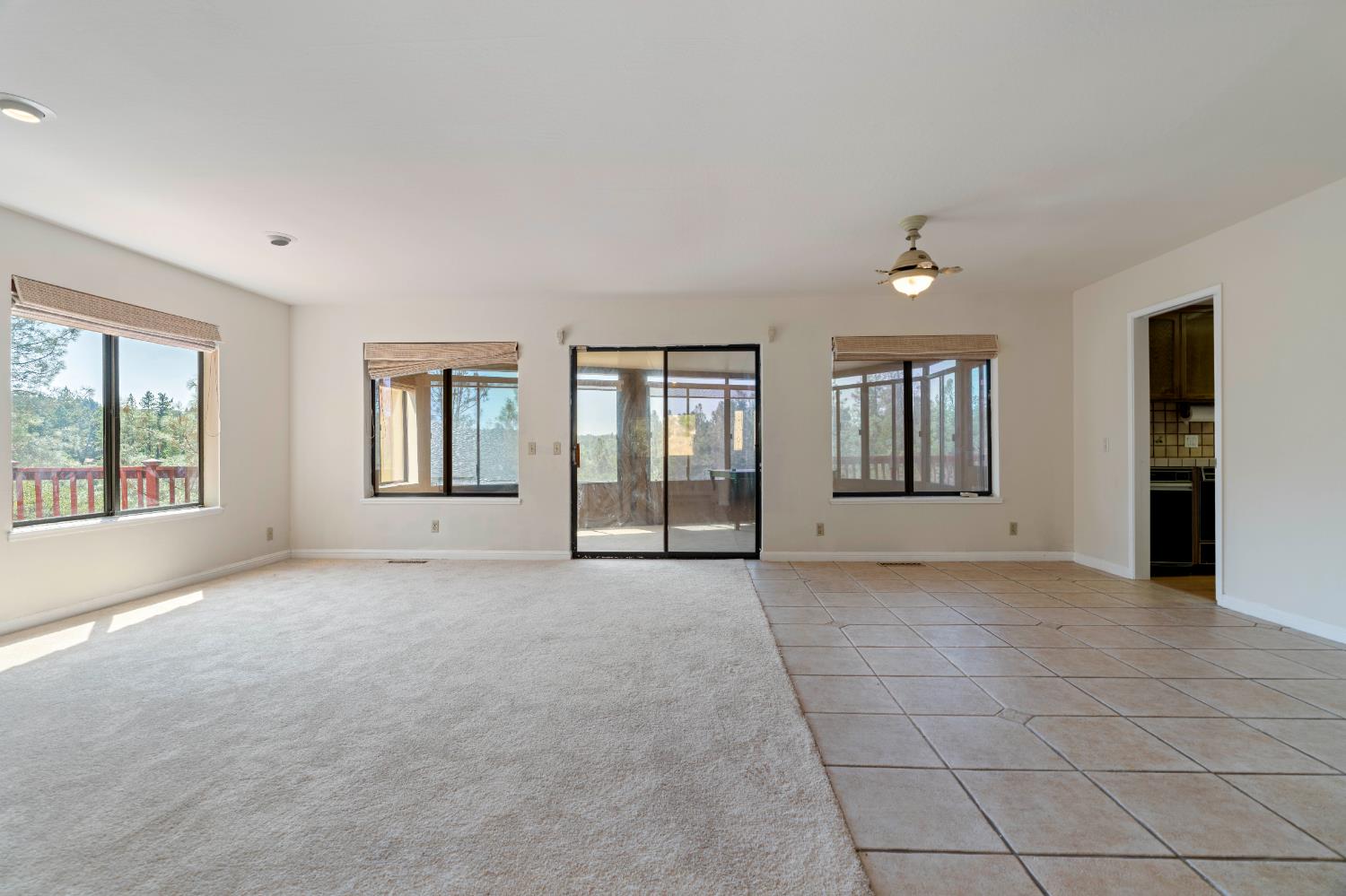 3830 Wilson Loop Placerville, CA 95667 - Photo 4 of 36 a view of an empty room with window and wooden floor