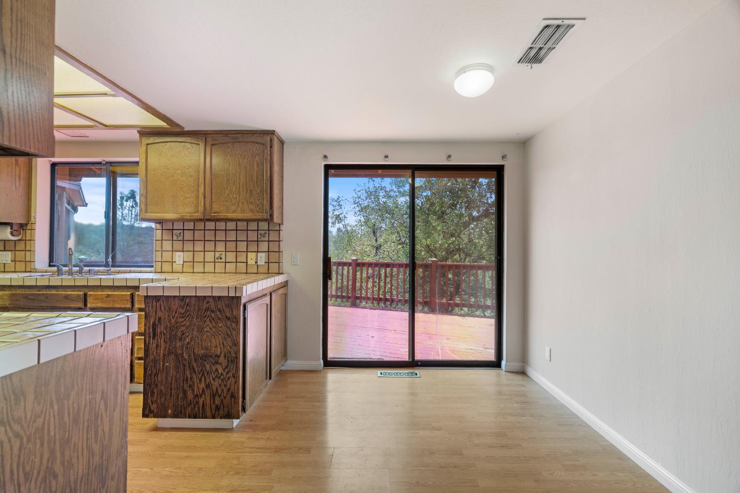 3830 Wilson Loop Placerville, CA 95667 - Photo 7 of 36 a view of kitchen with granite countertop cabinets and sink