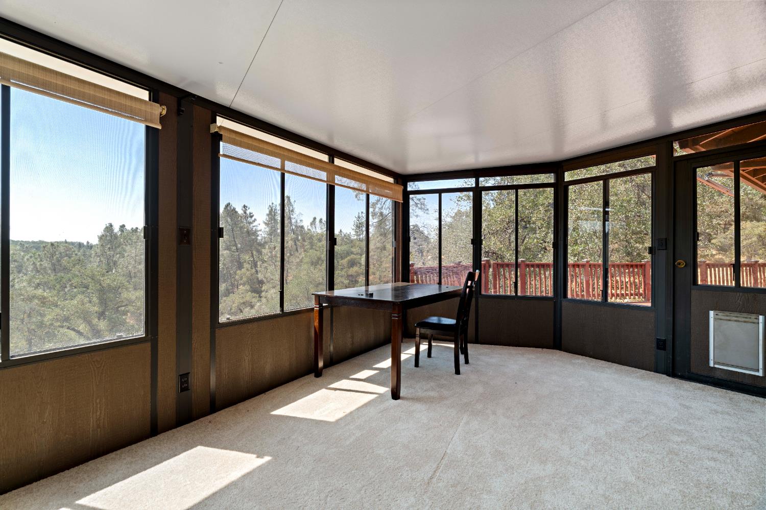 3830 Wilson Loop Placerville, CA 95667 - Photo 10 of 36 a living room with furniture and a floor to ceiling window