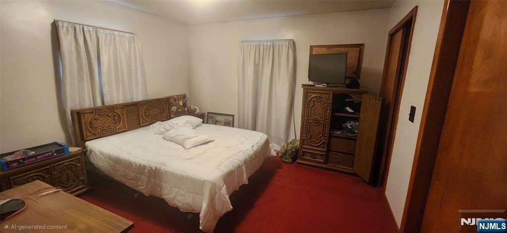 230 New Street Lyndhurst, NJ 07071 - Photo 8 of 10 a bedroom with a bed and a closet