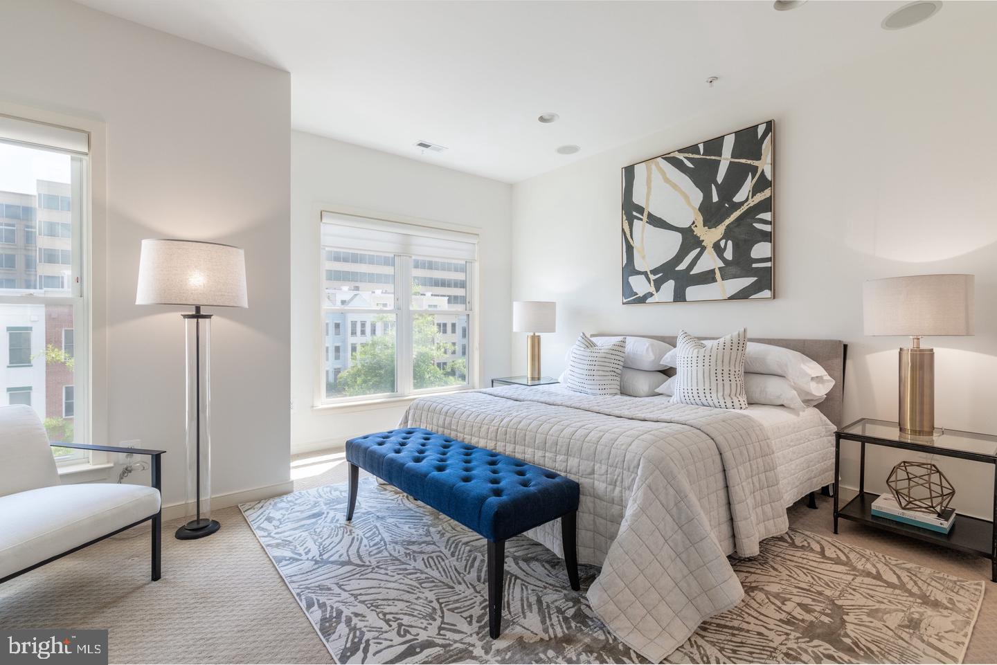 330 L Street Southeast Washington, DC 20003 - Photo 3 of 17 a spacious bedroom with a bed a couch and a large window