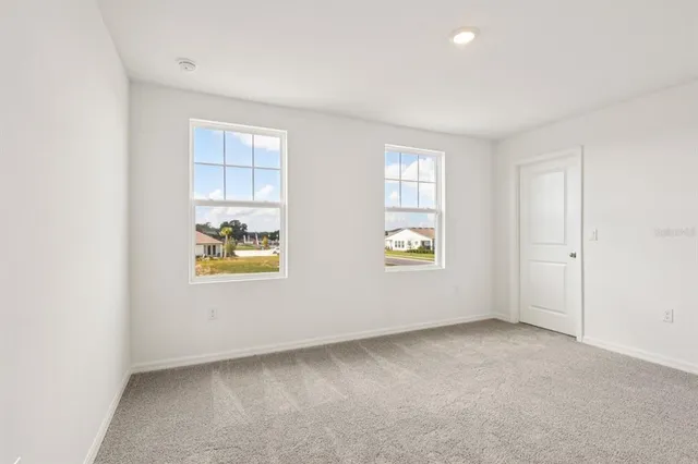 an empty room with windows