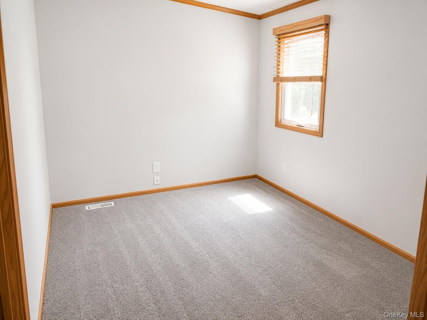 182-184 Mutton Hill Road Neversink, NY 12765 - Photo 13 of 36 Neutral gray carpeting throughout the room