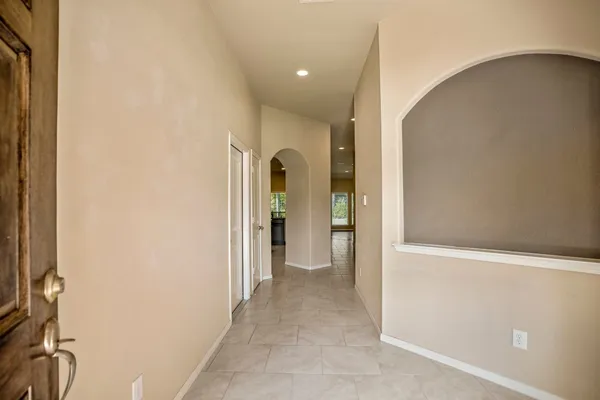 a workspace with furniture hardwood and a window