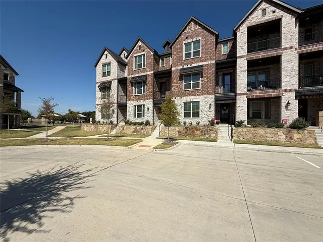 a view of a building with a street