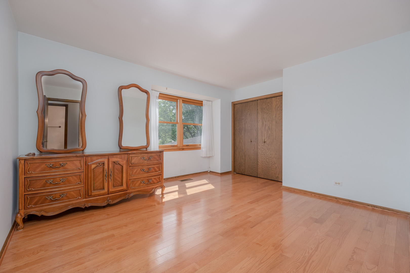 8436 Clynderven Road Burr Ridge, IL 60527 - Photo 22 of 39 an empty room with windows cabinet and mirror