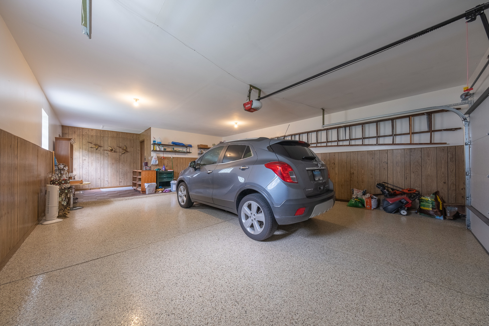 8436 Clynderven Road Burr Ridge, IL 60527 - Photo 29 of 39 a car parked in a garage