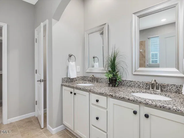 a bath tub sitting next to a shower