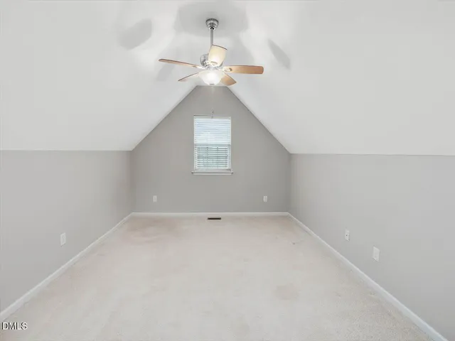 a view of storage and utility room with washer and dryer
