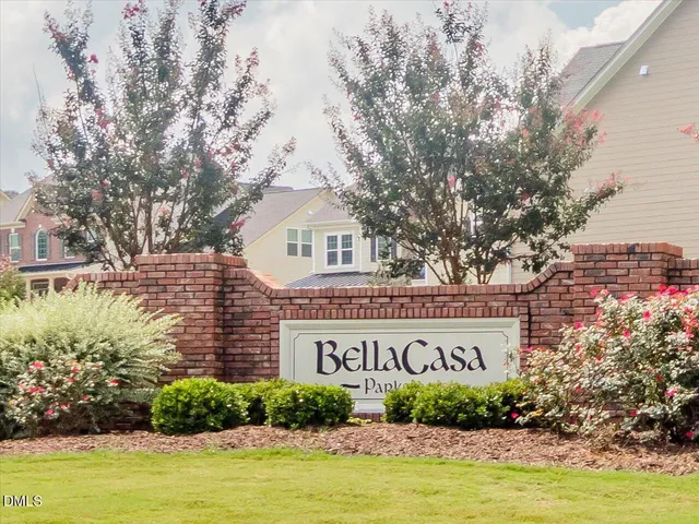 an outdoor space with swimming pool and furniture