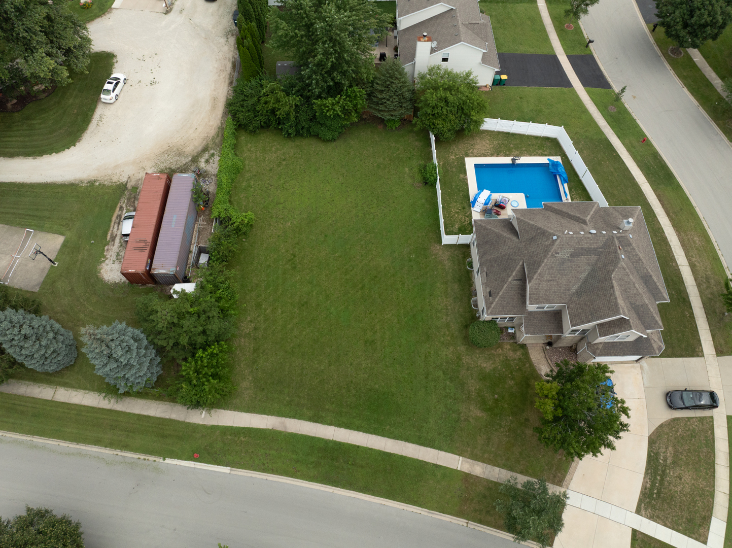 22604 Prairie Crossing Plainfield, IL 60544 - Photo 4 of 7 an aerial view of a house having swimming pool garden and patio
