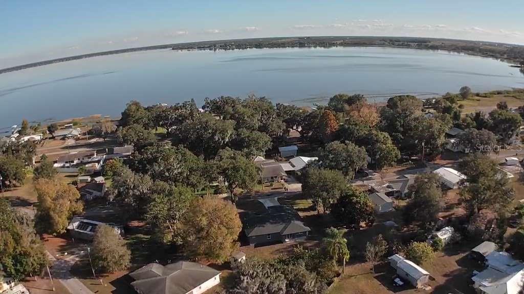 121 Argyle Avenue Frostproof, FL 33843 - Photo 6 of 26 a view of a lake