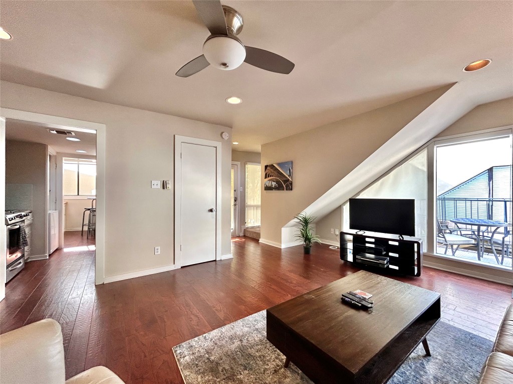 1106 West 6th Street, Unit 205 Austin, TX 78703 - Photo 5 of 27 Living room featuring healthy amount of natural light, dark wood-style flooring, recessed lighting, and ceiling fan