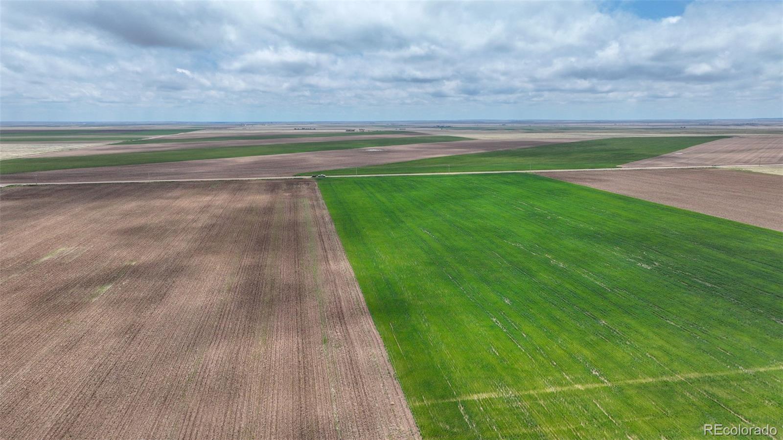 Tbd Grover, CO 80729 - Photo 15 of 23 a view of a golf course with a lake