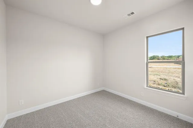 an empty room with a window