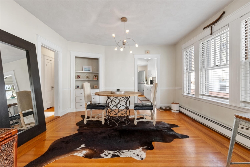 178 Norfolk Avenue, Unit 178 Swampscott, MA 01907 - Photo 11 of 33 a living room with furniture window and wooden floor