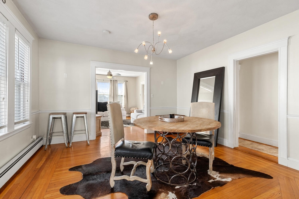 178 Norfolk Avenue, Unit 178 Swampscott, MA 01907 - Photo 14 of 33 a view of a dining room with furniture and wooden floor