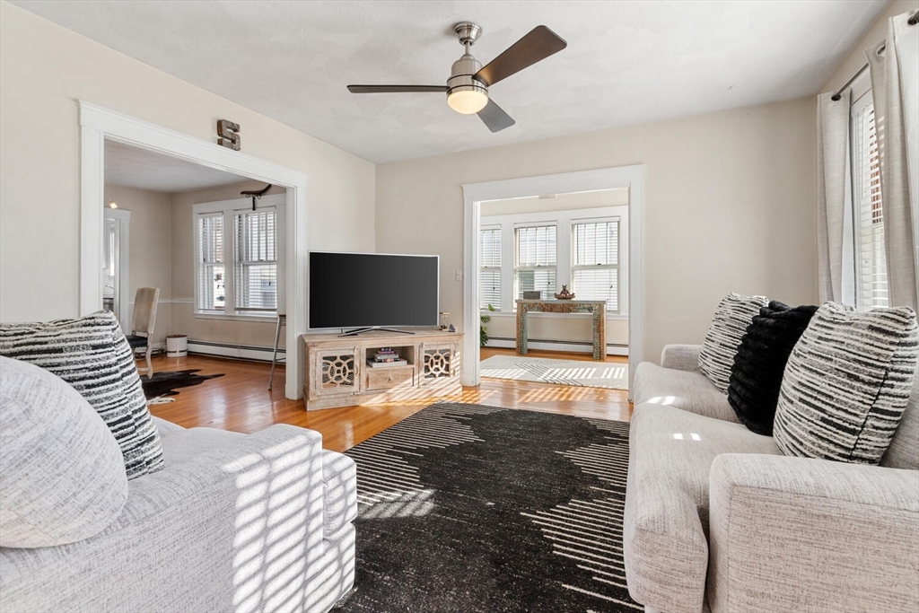 178 Norfolk Avenue, Unit 178 Swampscott, MA 01907 - Photo 3 of 33 a bedroom with bed and a flat screen tv