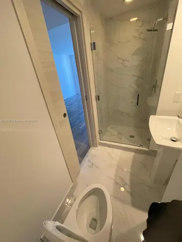 a utility room with washer and dryer