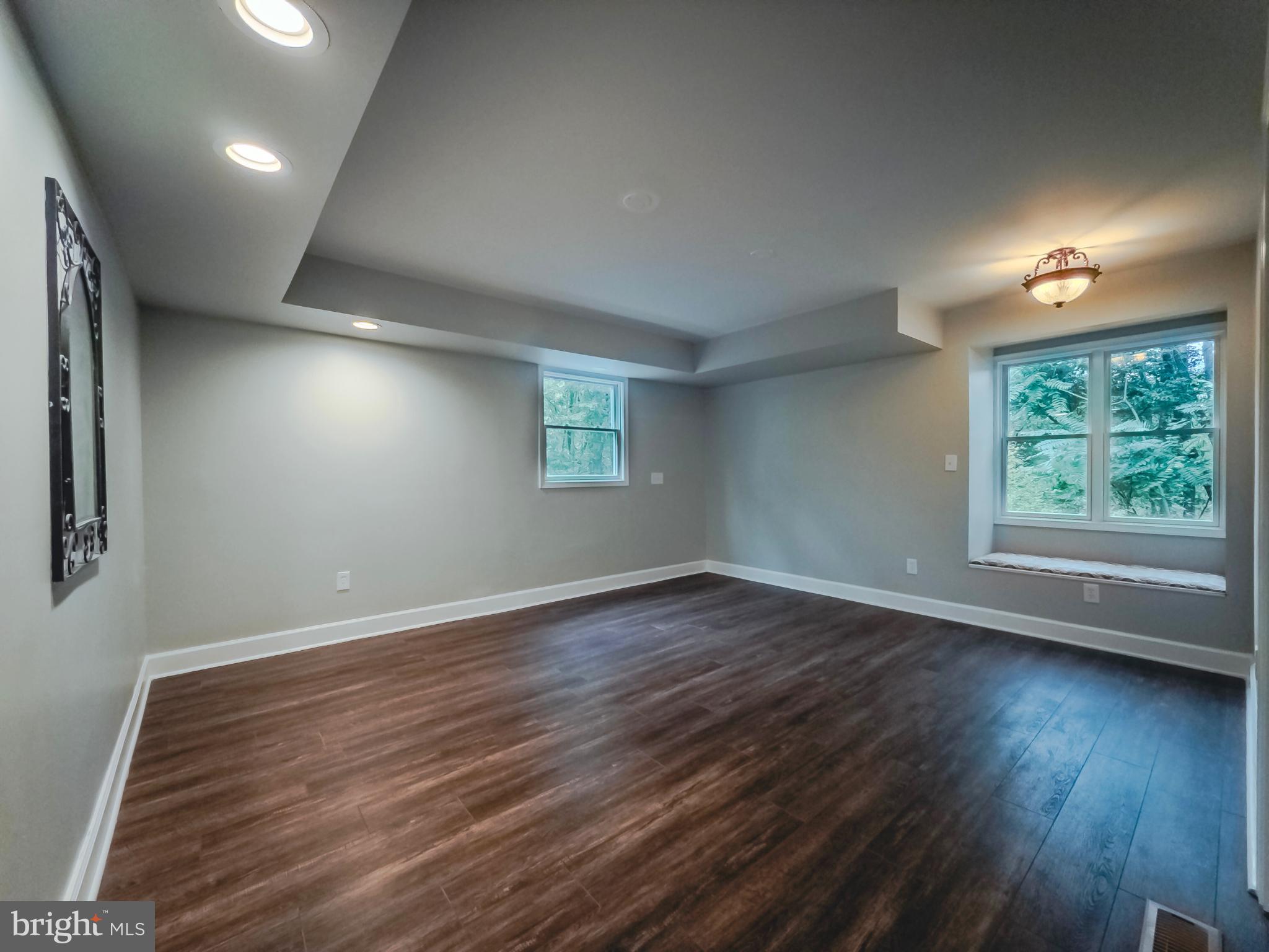 8749 Ramsburg Road Thurmont, MD 21788 - Photo 20 of 61 an empty room with wooden floor and windows