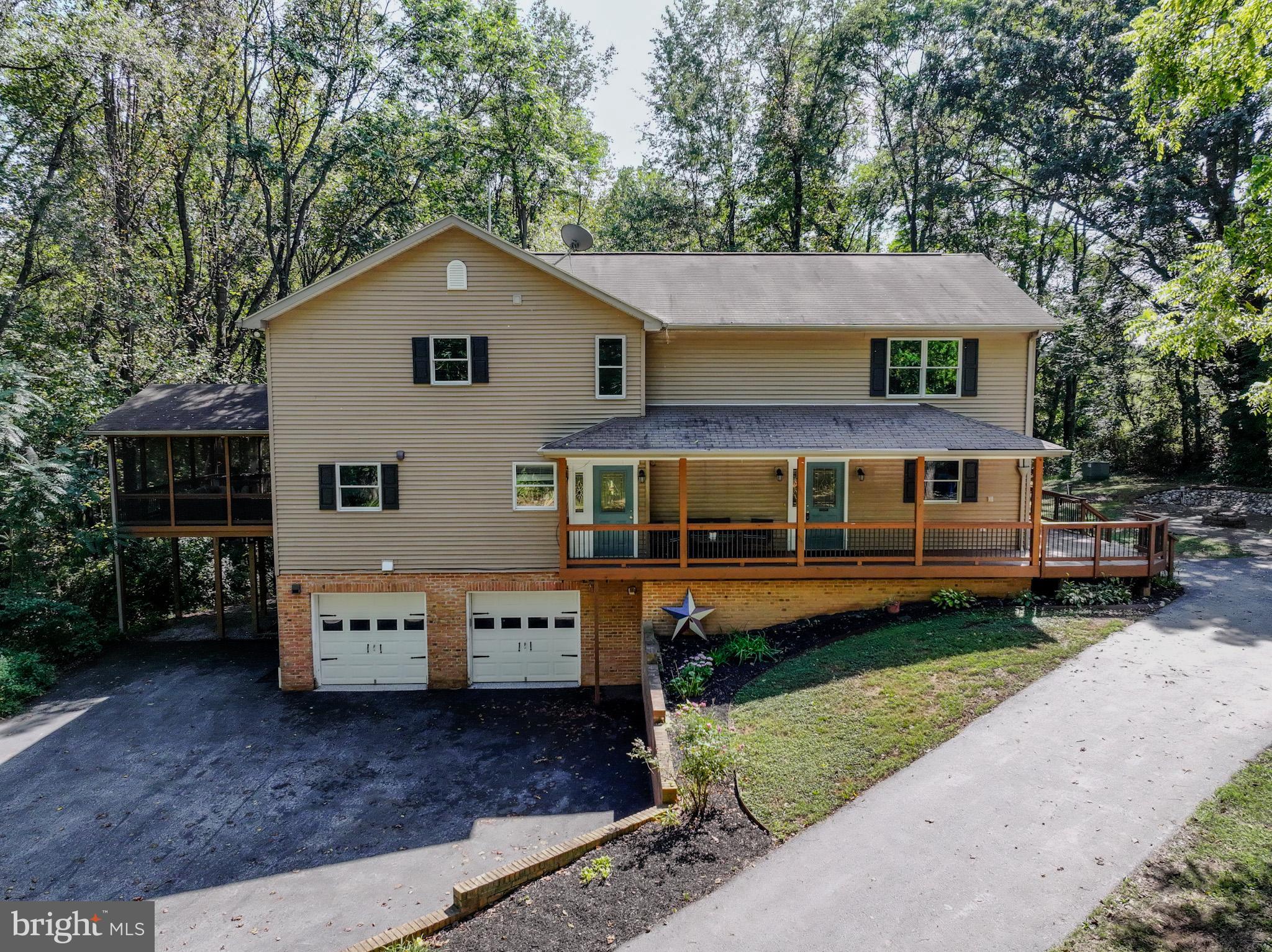 8749 Ramsburg Road Thurmont, MD 21788 - Photo 2 of 61 a view of a house with a yard