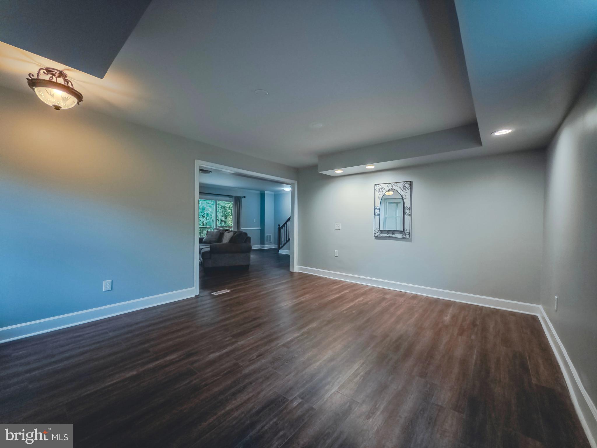 8749 Ramsburg Road Thurmont, MD 21788 - Photo 22 of 61 wooden floor in an empty room with a window