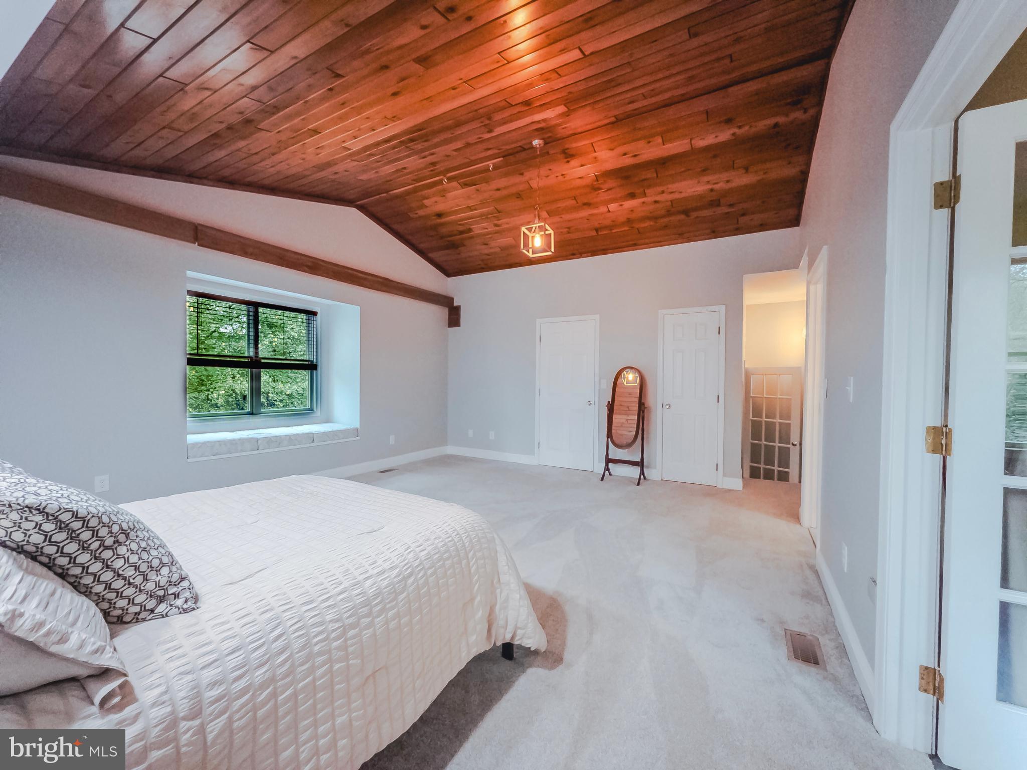 8749 Ramsburg Road Thurmont, MD 21788 - Photo 31 of 61 a bedroom with a bed and a window