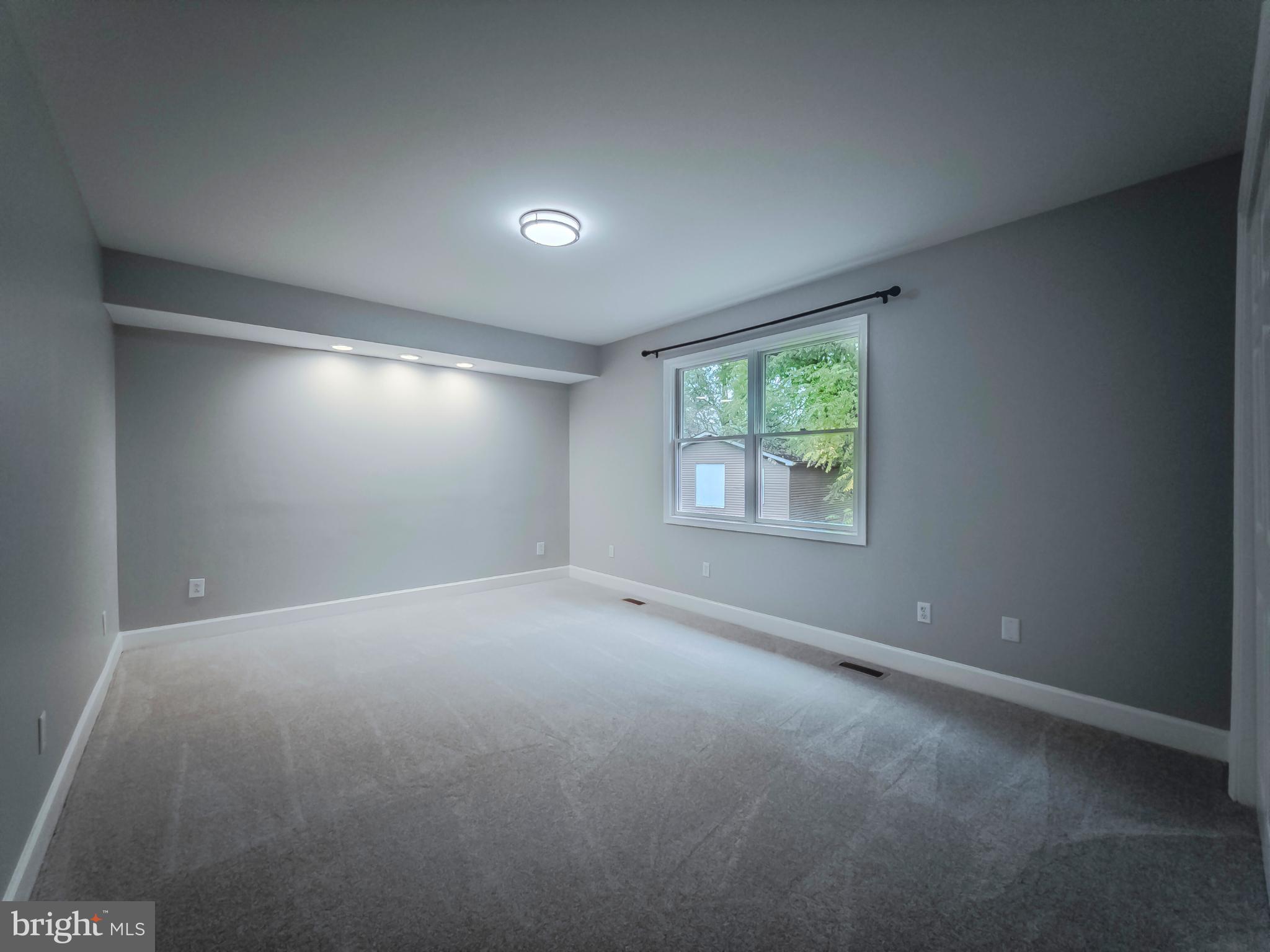 8749 Ramsburg Road Thurmont, MD 21788 - Photo 38 of 61 an empty room with windows