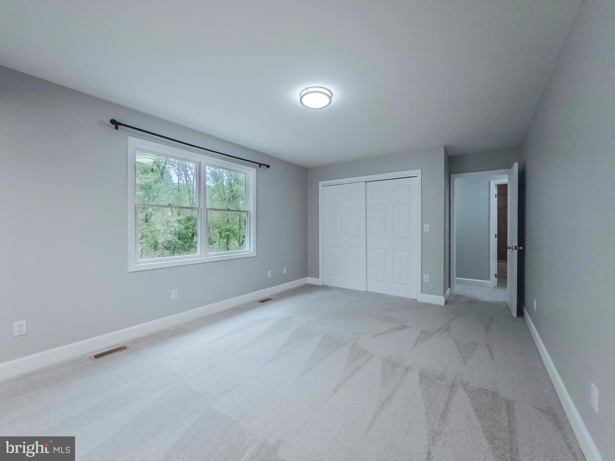 8749 Ramsburg Road Thurmont, MD 21788 - Photo 39 of 61 an empty room with windows and closet