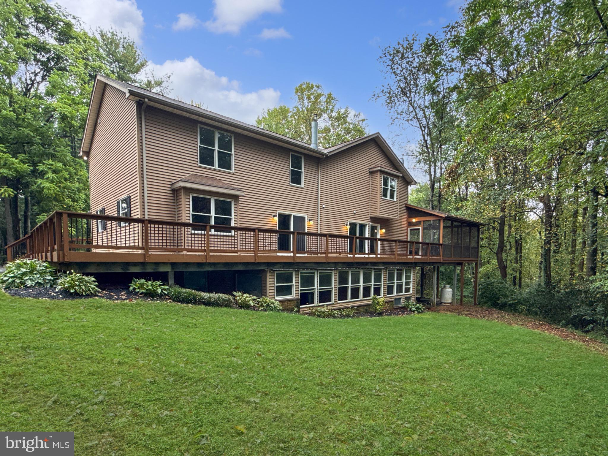 8749 Ramsburg Road Thurmont, MD 21788 - Photo 4 of 61 a view of house with a yard