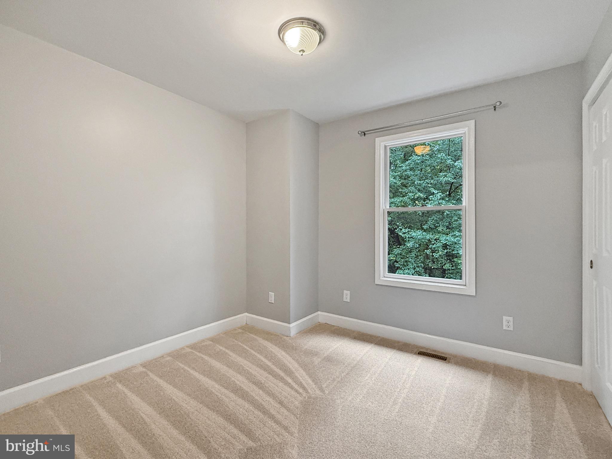 8749 Ramsburg Road Thurmont, MD 21788 - Photo 46 of 61 a bedroom with a bed and a window