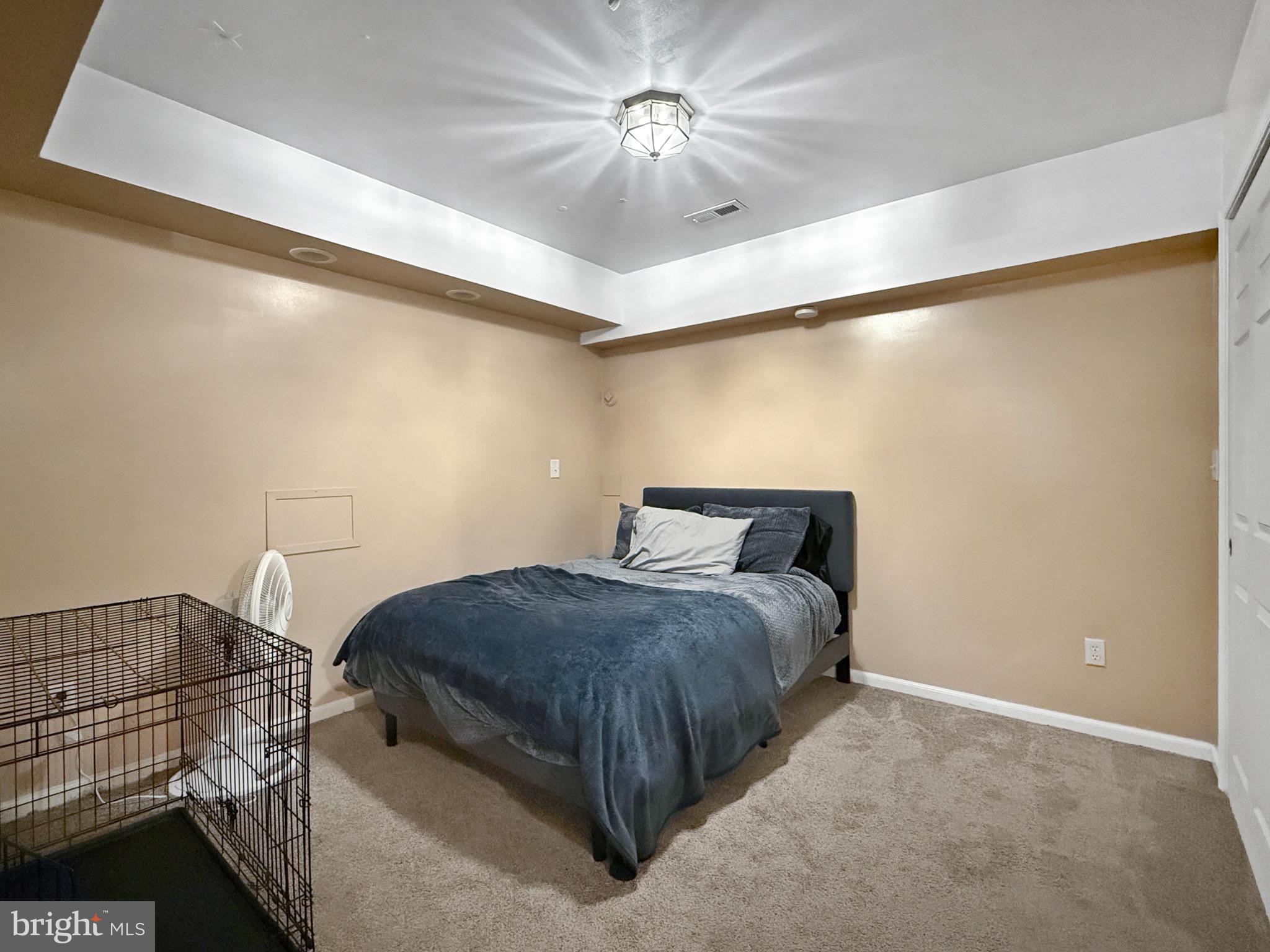 8749 Ramsburg Road Thurmont, MD 21788 - Photo 50 of 61 a bedroom with a bed and a ceiling fan