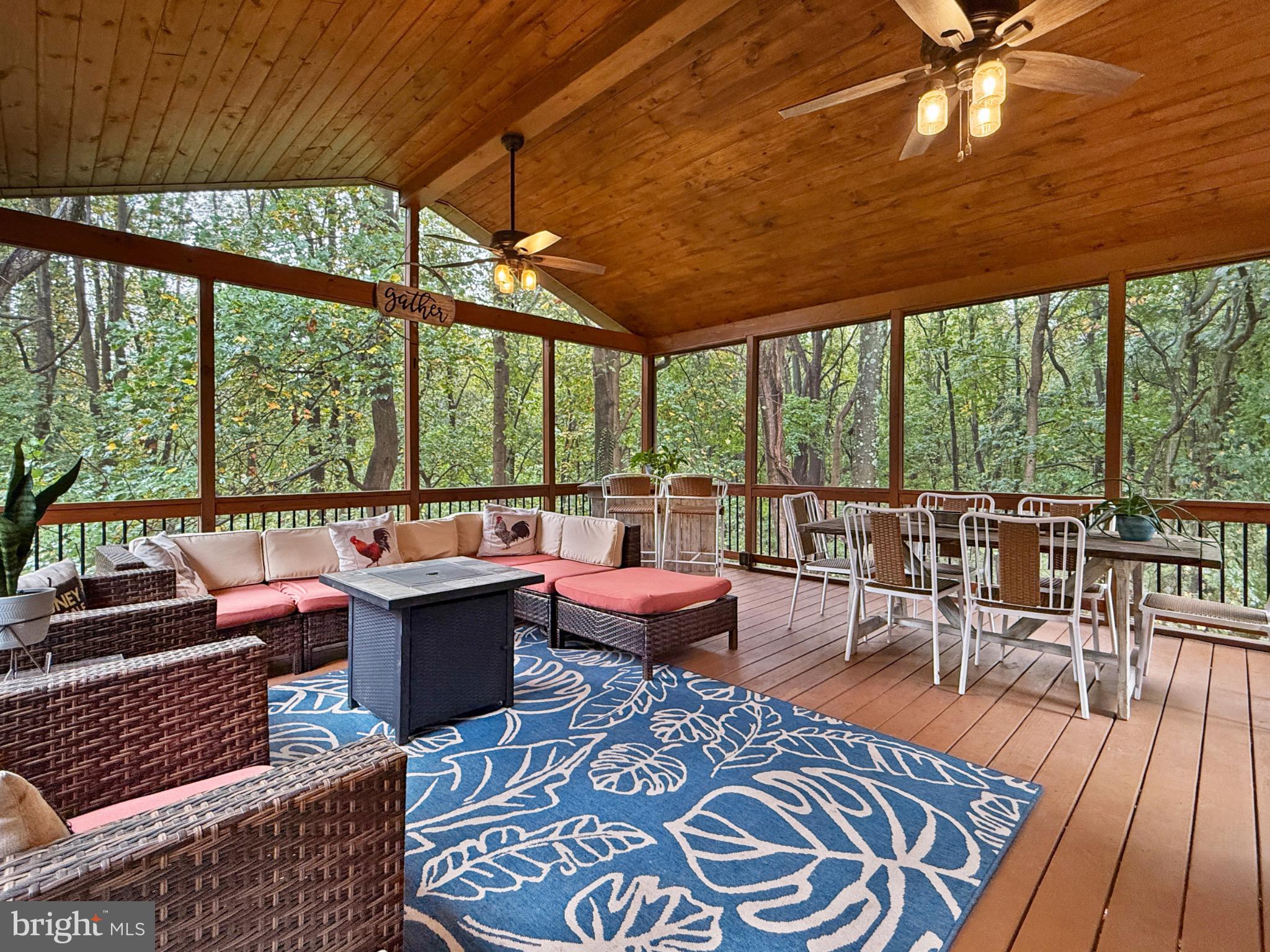 8749 Ramsburg Road Thurmont, MD 21788 - Photo 8 of 61 a living room with furniture and a large window