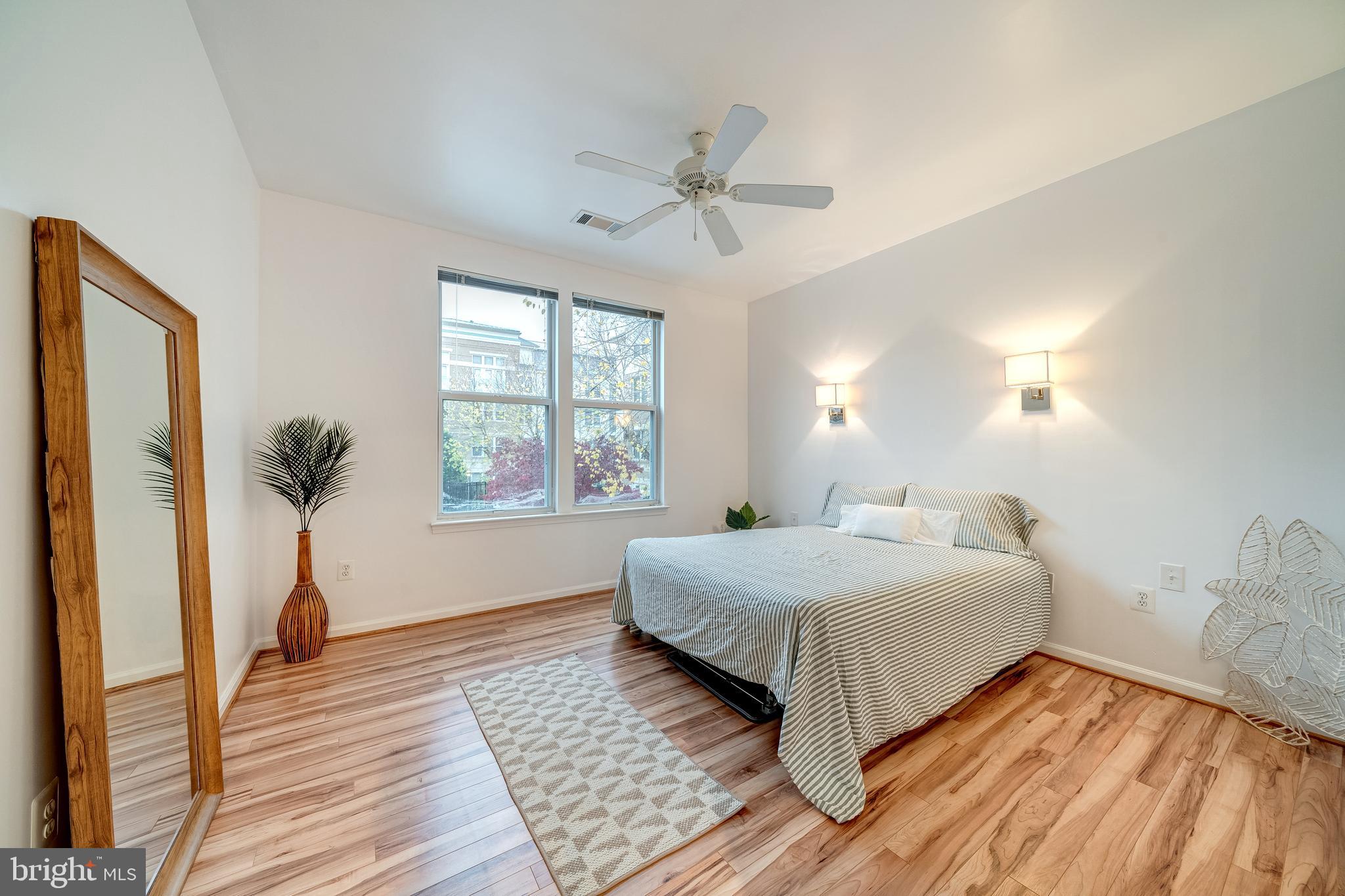 12000 Market Street, Unit 235 Reston, VA 20190 - Photo 26 of 45 Large Bedroom w/ HW Floors