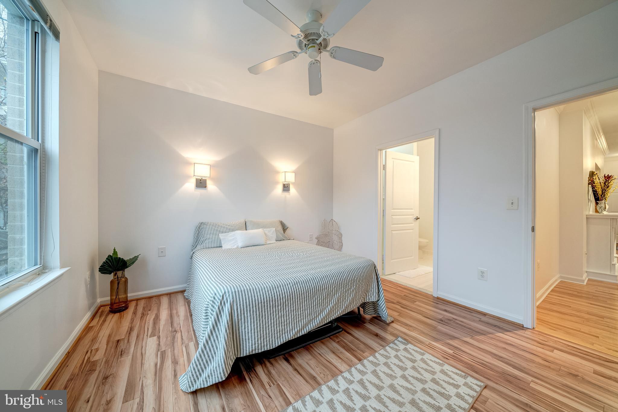 12000 Market Street, Unit 235 Reston, VA 20190 - Photo 27 of 45 View to Attached Bath