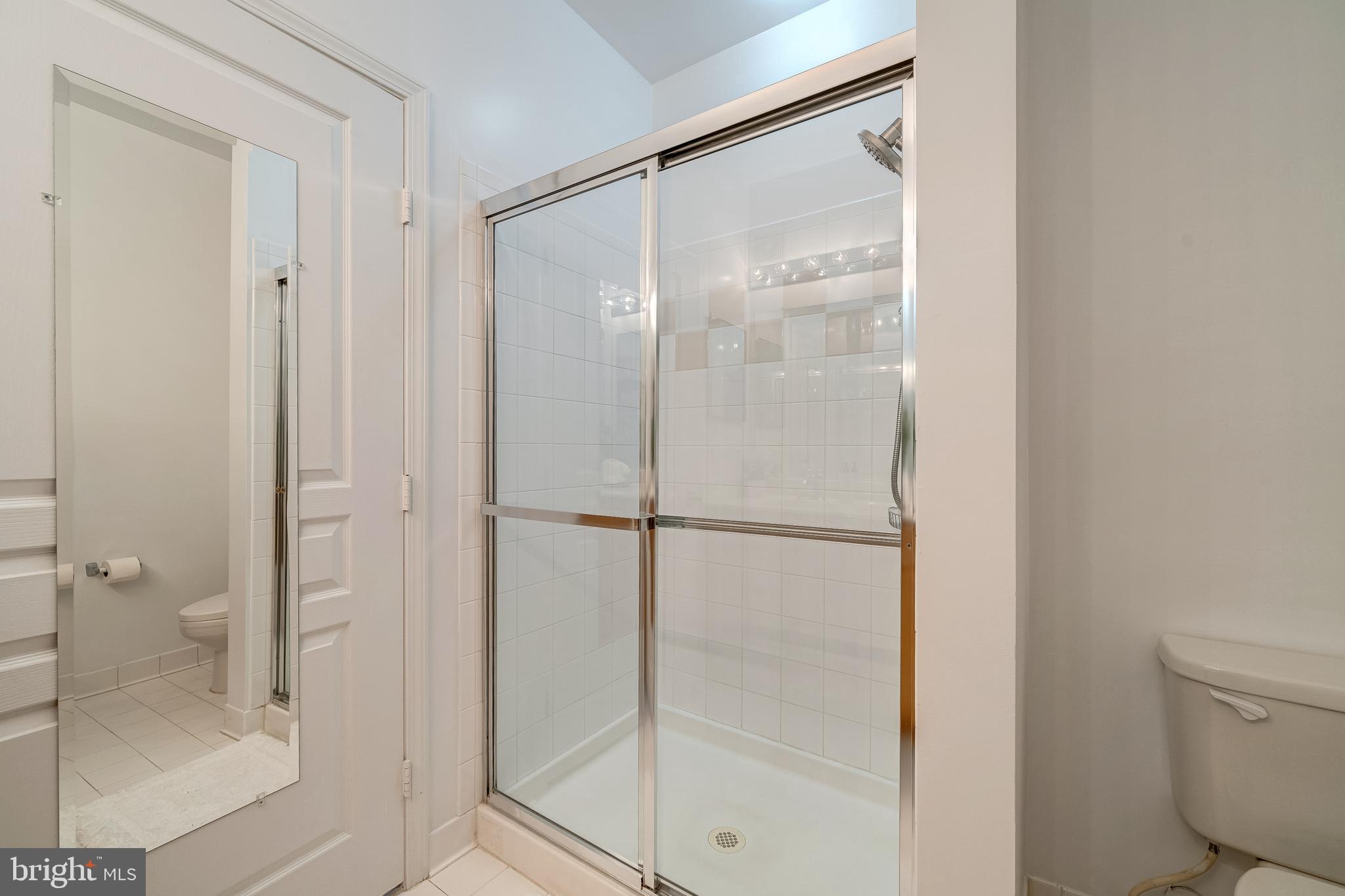 12000 Market Street, Unit 235 Reston, VA 20190 - Photo 29 of 45 Step-In Tile Shower