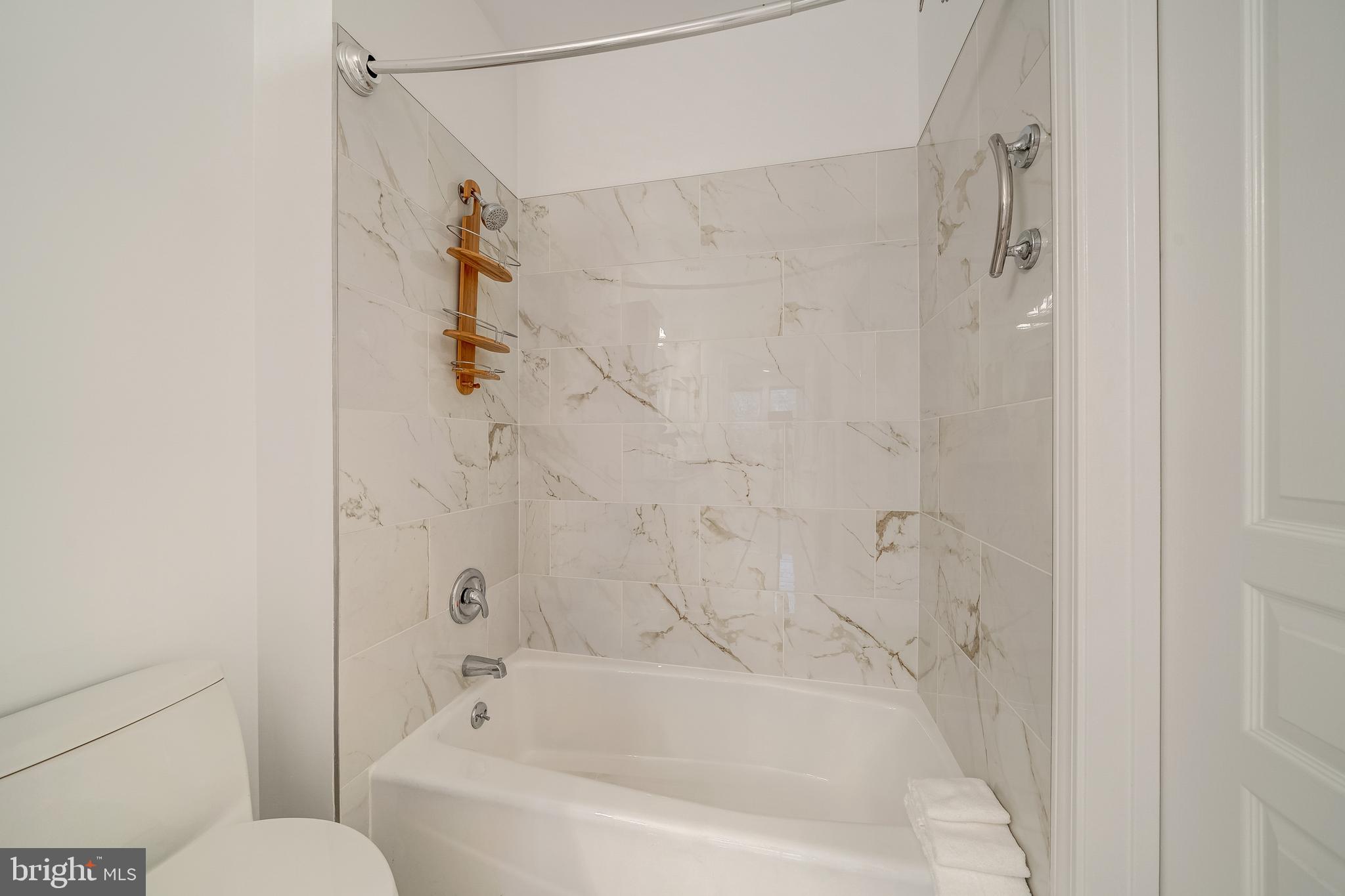 12000 Market Street, Unit 235 Reston, VA 20190 - Photo 36 of 45 Second bath w/Tile surround