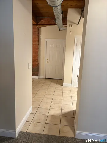 a view of empty room with windows