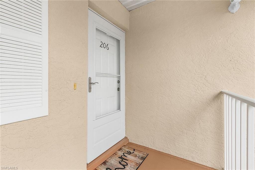 6780 Dennis Circle, Unit M206 Naples, FL 34104 - Photo 6 of 26 a view of utility room